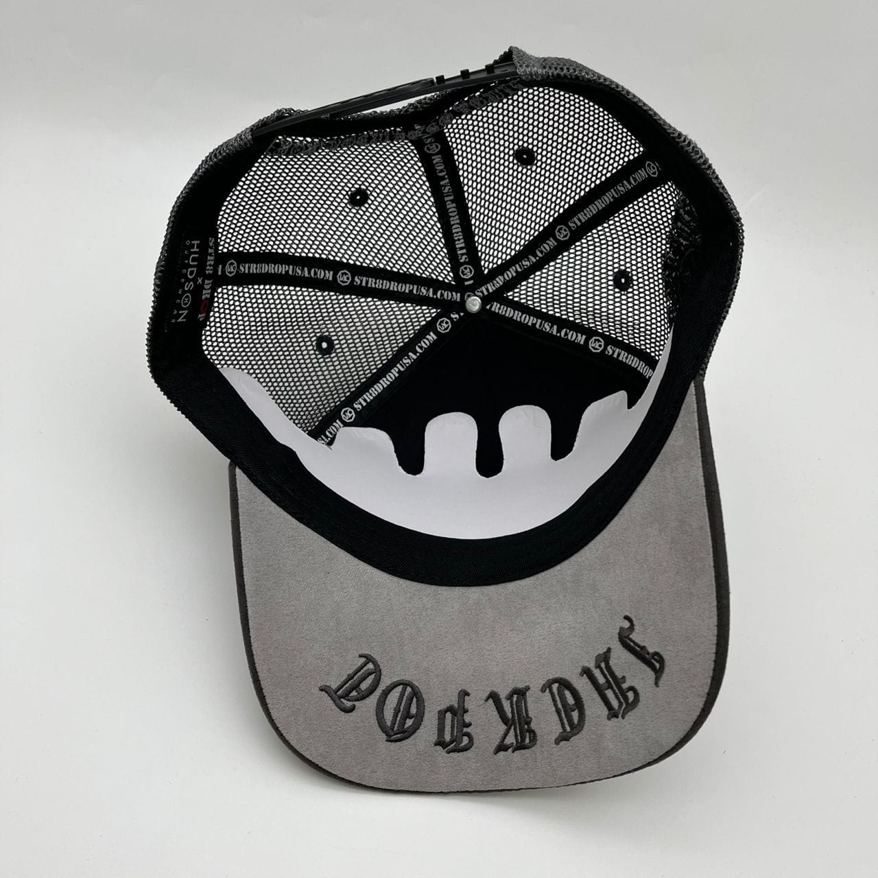 Hudson Outerwear V2 Diamond Suede Trucker Hat with mesh back and curved brim, stylish outdoor headwear in diamond suede fabric.