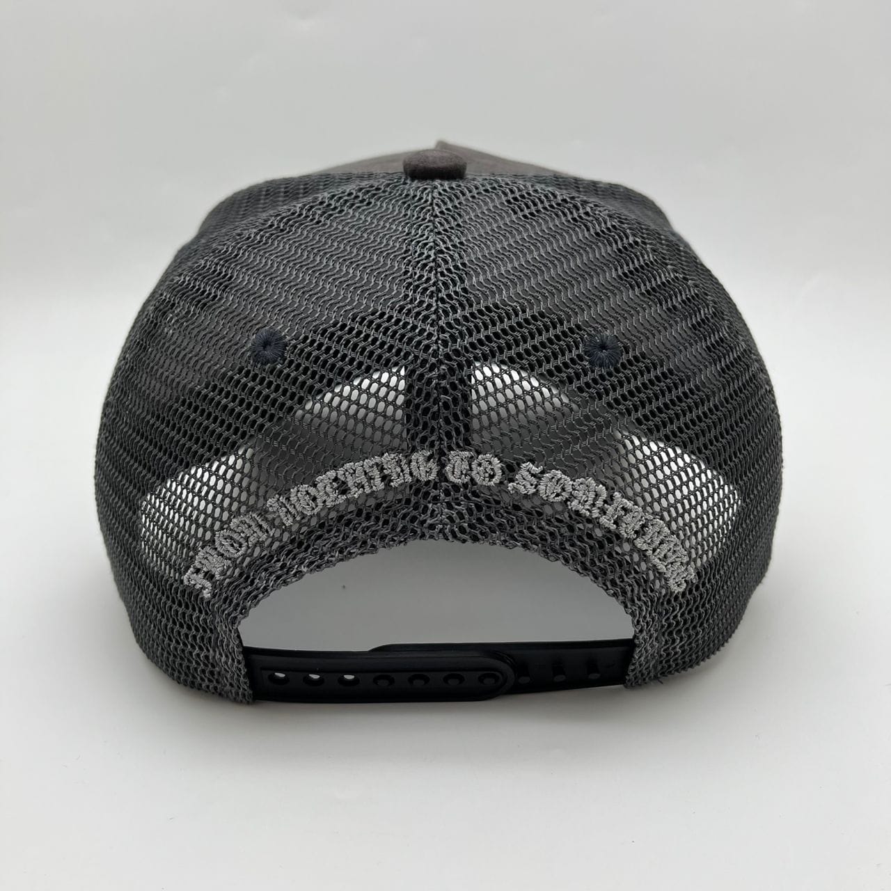 Hudson Outerwear V2 Diamond Suede Trucker Hat with mesh back and adjustable strap, featuring a stylish diamond suede front panel.