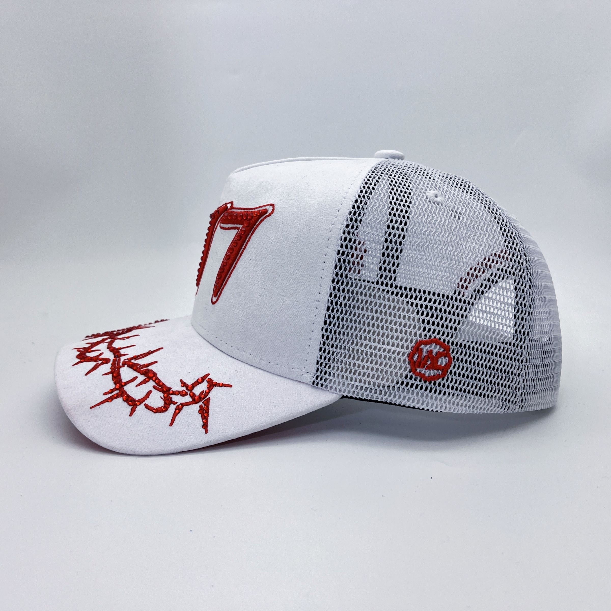 White Hudson Outerwear V2 Diamond Suede Trucker Hat with mesh back and adjustable snap closure.