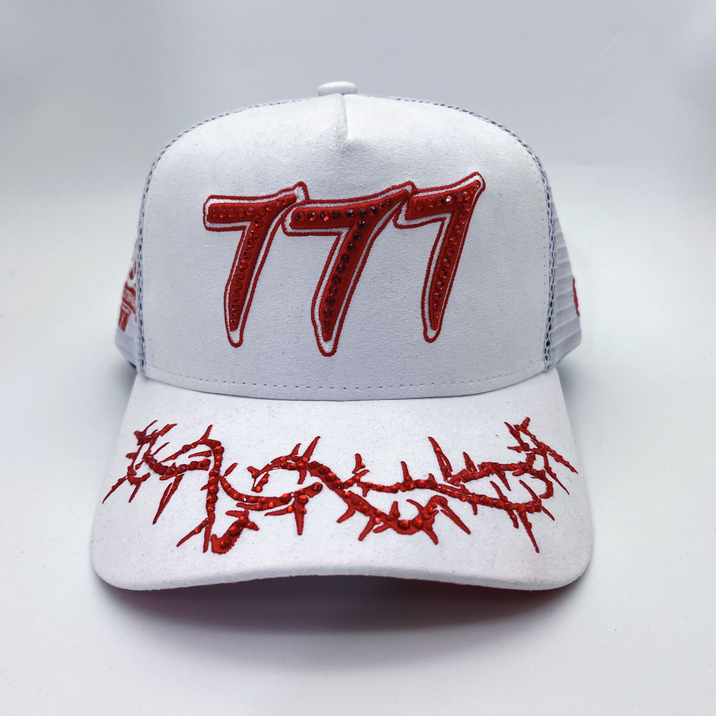 White Hudson Outerwear V2 Diamond Suede Trucker Hat with structured front and adjustable strap.