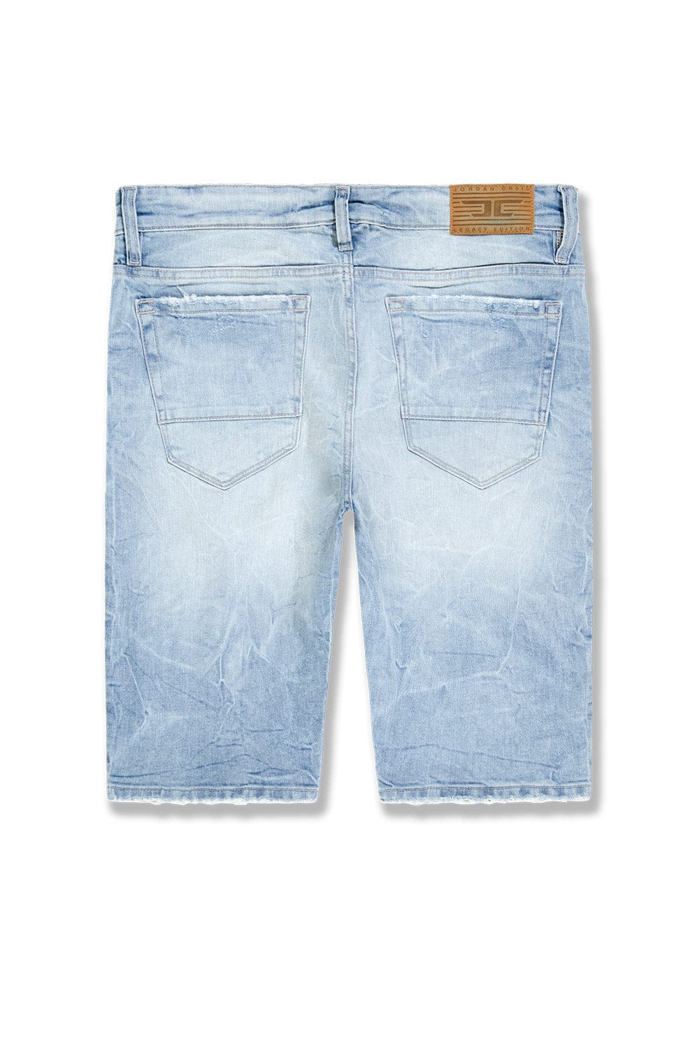 Jordan Craig OG Cascade Jean Shorts shown in a casual, distressed denim style with rolled cuffs and classic five-pocket design.