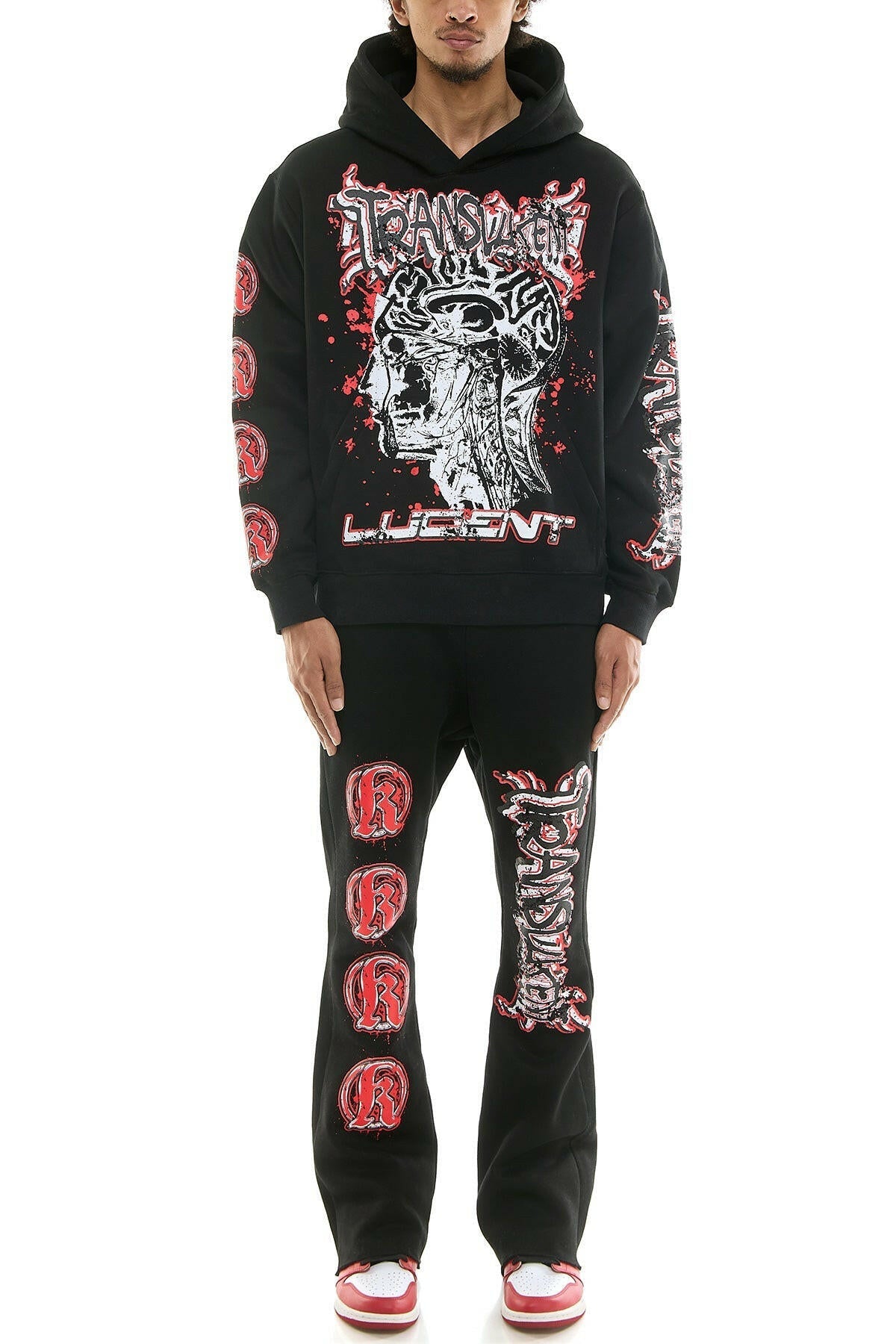 KDNK translucent black sweatsuit set displayed on a mannequin, showcasing its stylish and modern design.