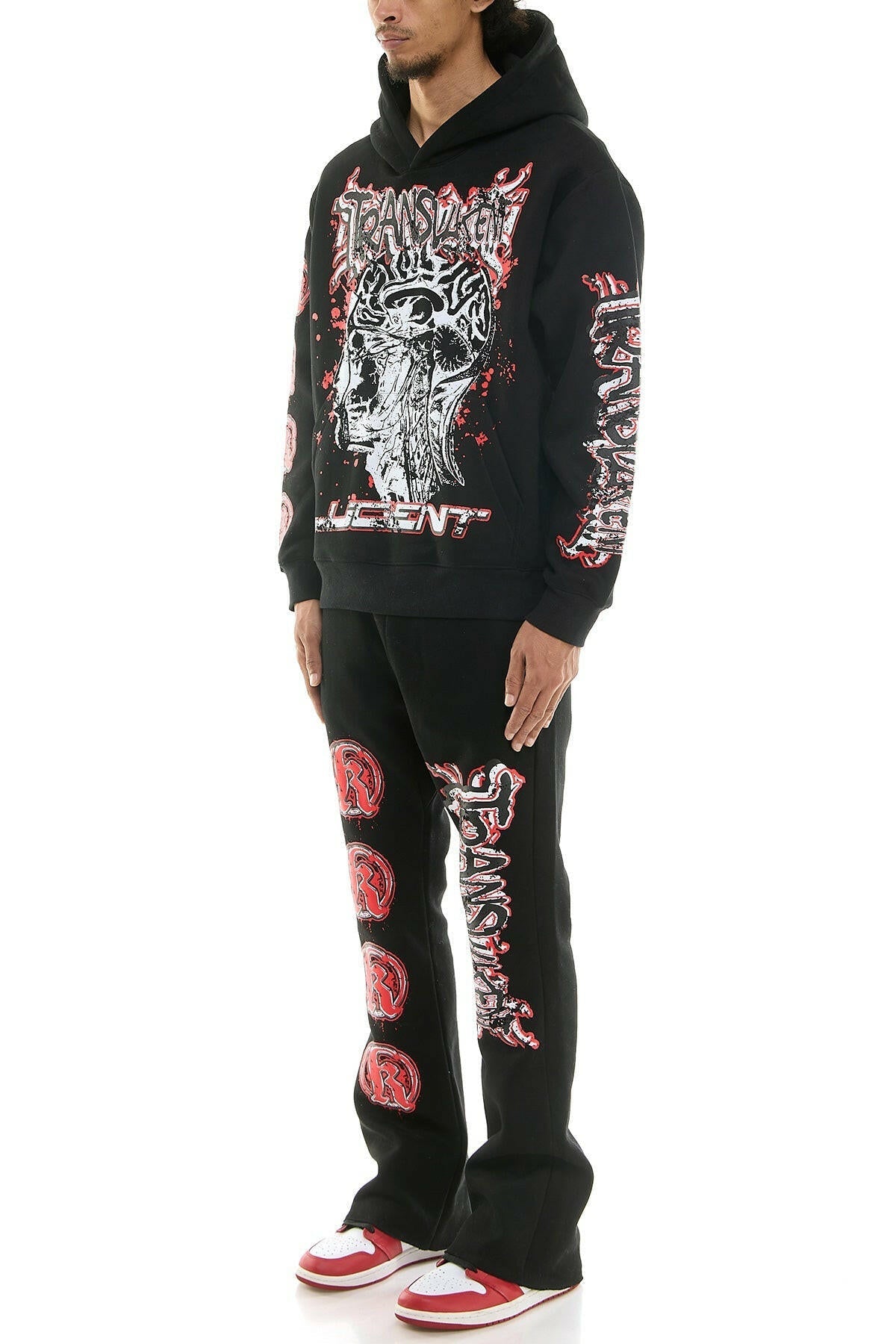 KDNK translucent black sweatsuit set featuring a relaxed fit and lightweight fabric, perfect for casual wear.