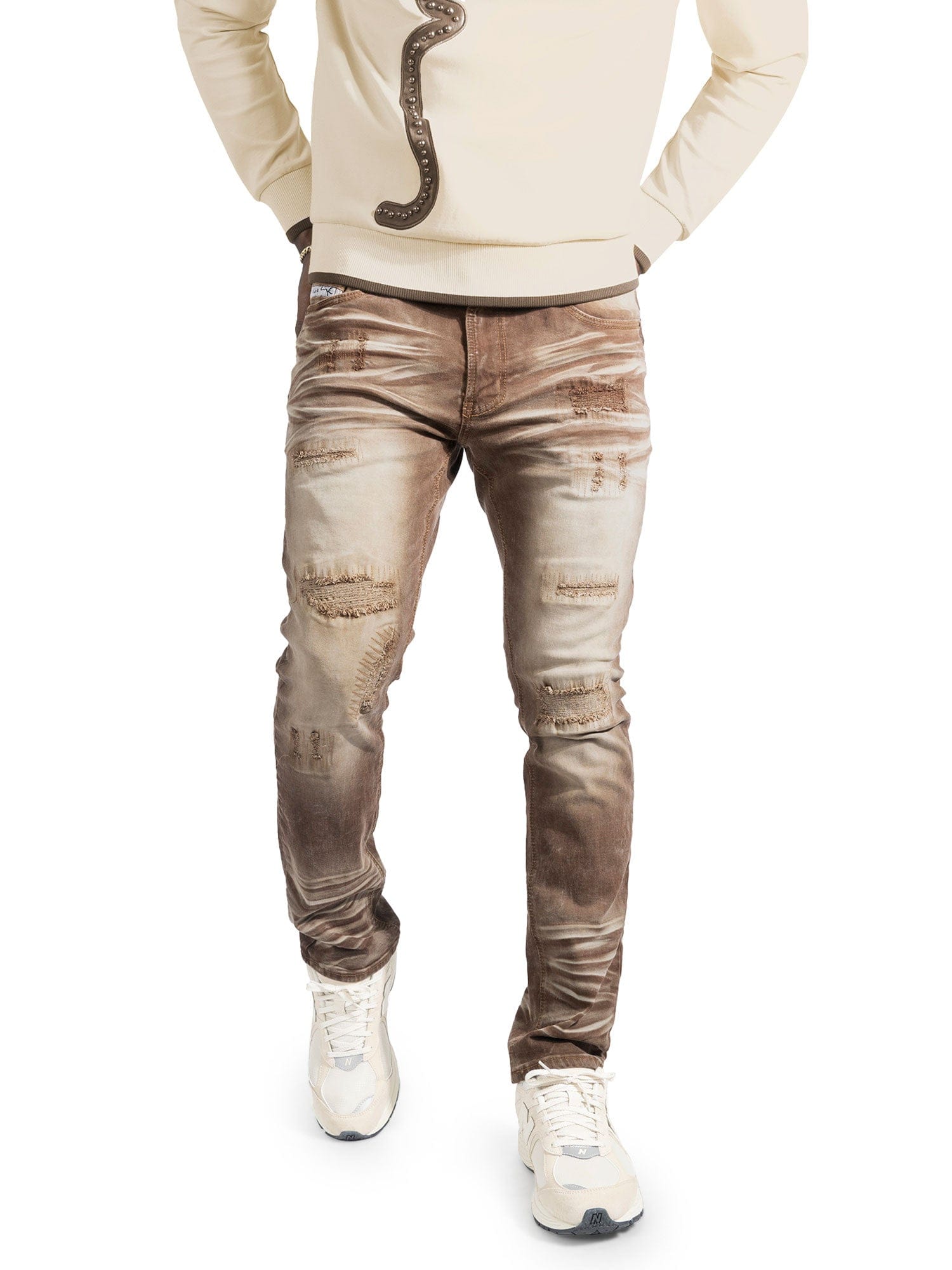 Makobi Lorenzo M1975 brown denim jeans displayed on a model, featuring classic fit and detailed stitching.