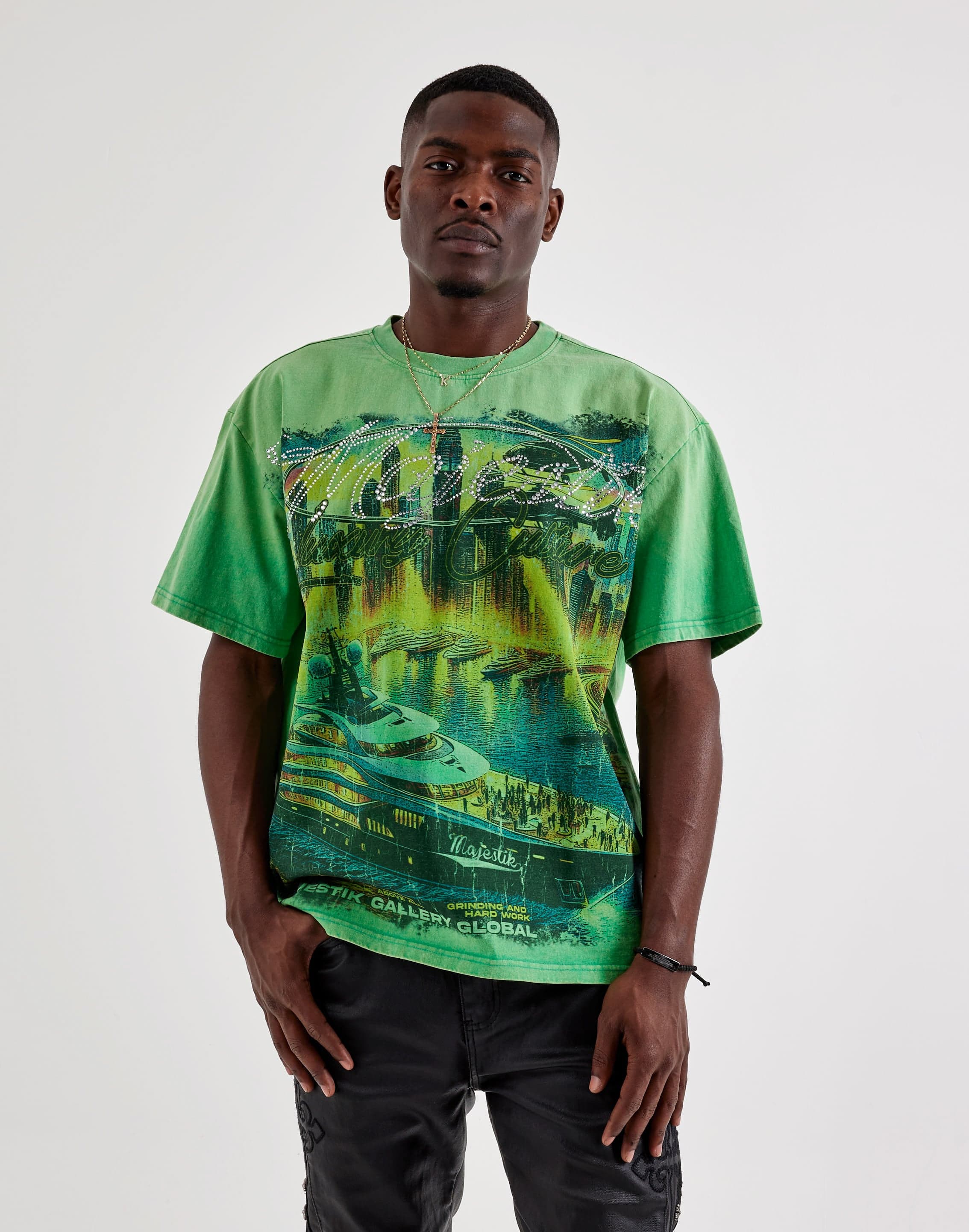 Majestik Tour Tee in multi-color design, casual T-shirt with graphic print, on a plain background.