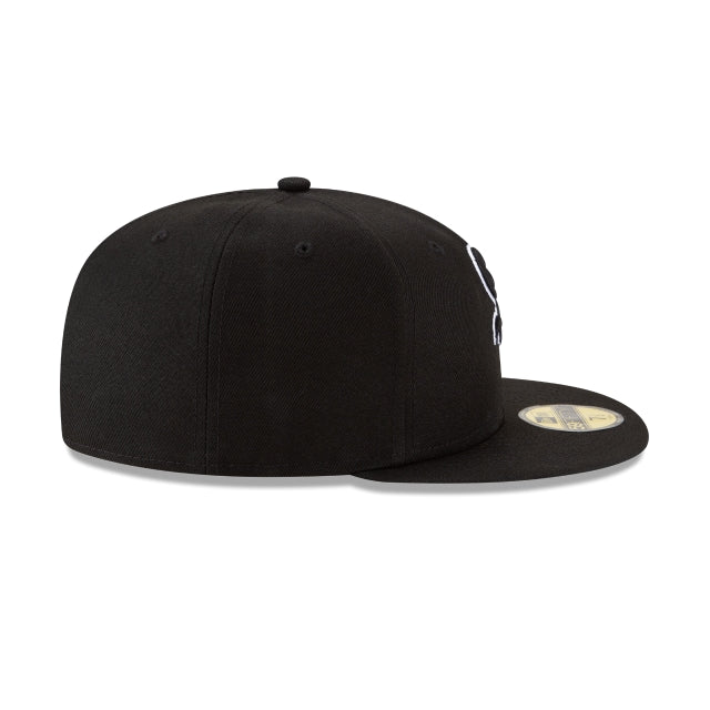 New Era Black 59FIFTY fitted hat featuring White Sox logo, showcasing a sleek design and structured silhouette.