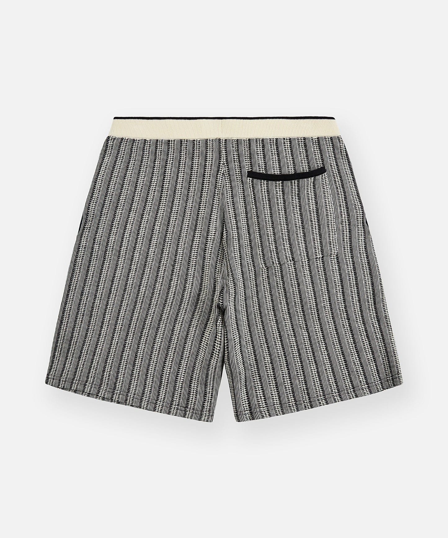 Paper Planes knit set with cozy, colorful patterns for kids, featuring a sweater and pants from the Paper Planes brand.