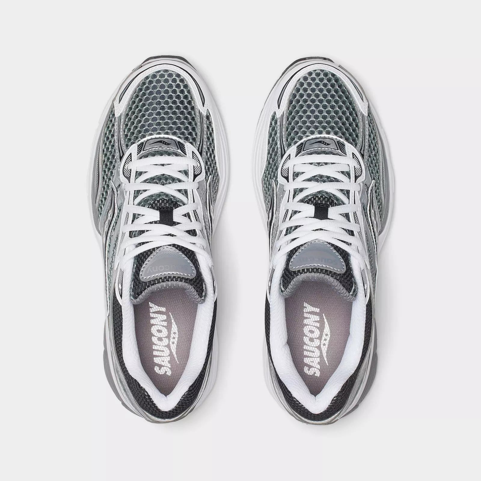 Men's Saucony ProGrid Omni 9 grey and silver sneakers with cushioned sole and breathable mesh upper.