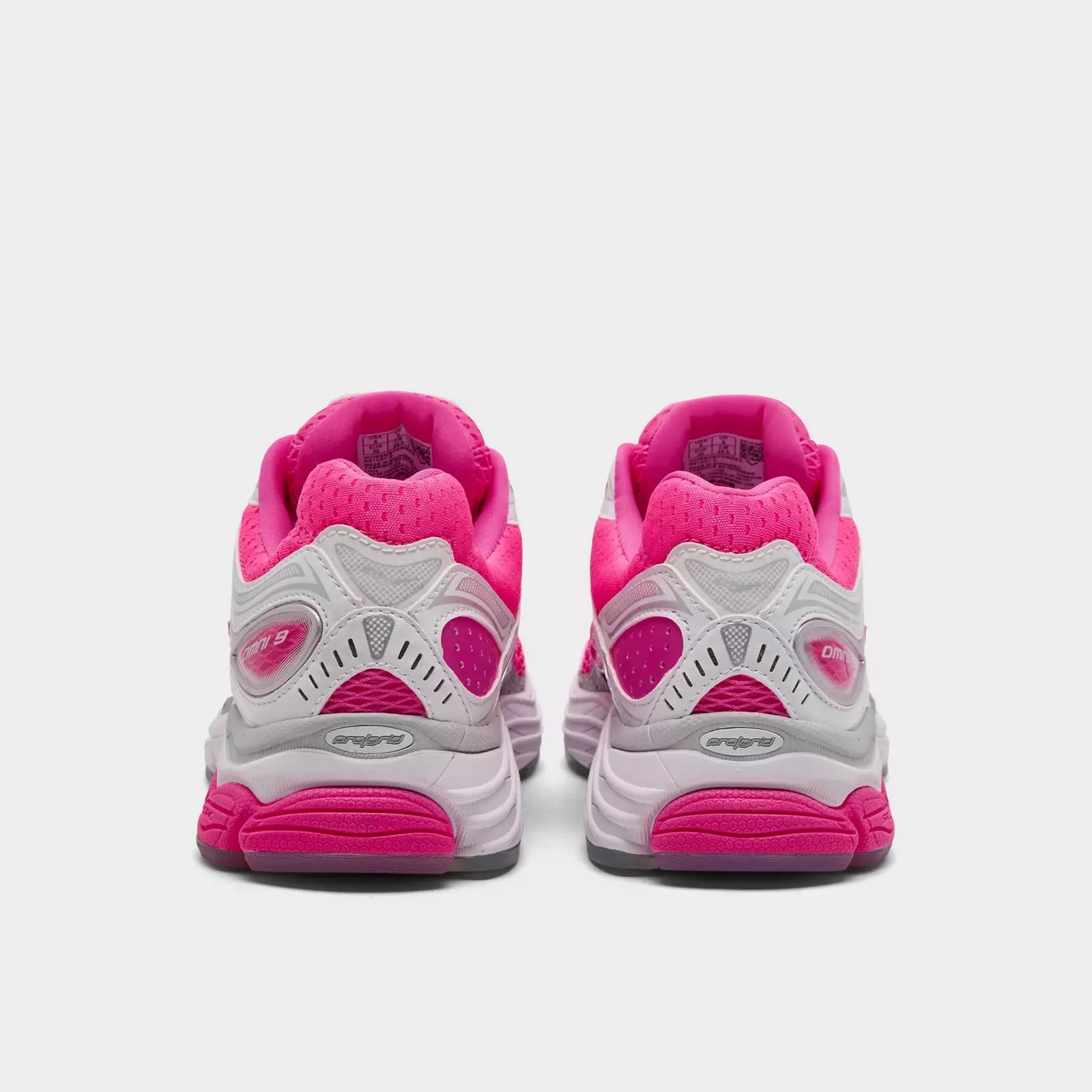 Pink Saucony ProGrid Omni 9 women's sneakers with cushioned soles and supportive design, perfect for running and active wear.